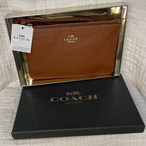 Coach Pebbled Leather Wristlet in Saddle Brown with Gold Logo